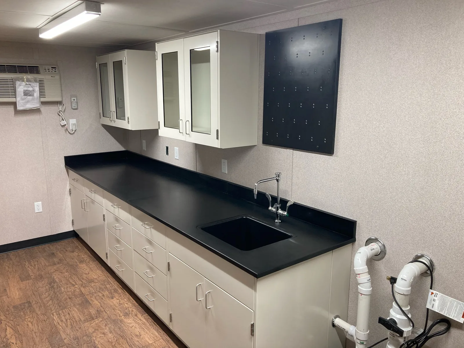 Sink and work surface inside a custom mine laboratory