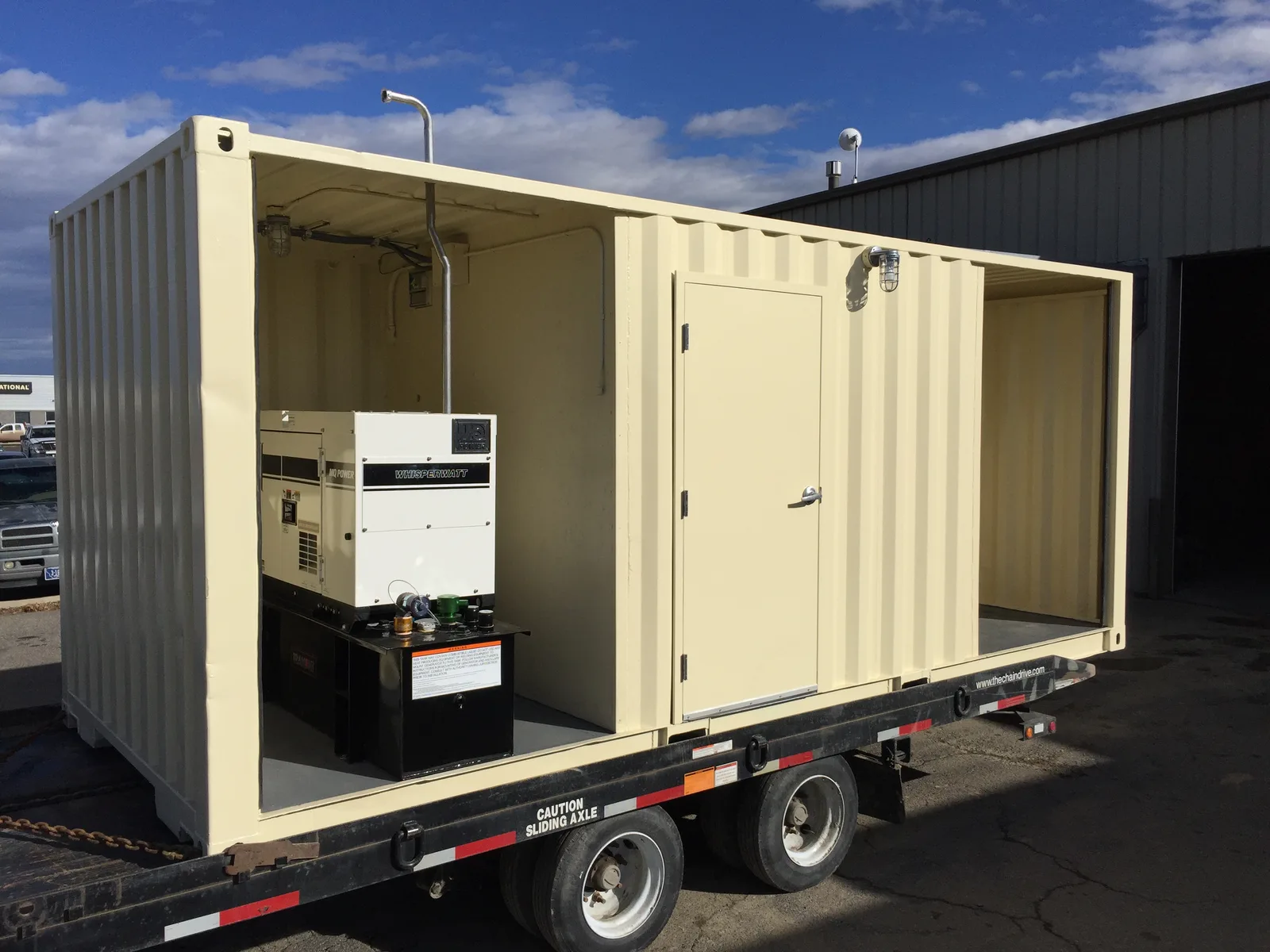 Generator side of a custom 8-by-20-foot radio tower support unit