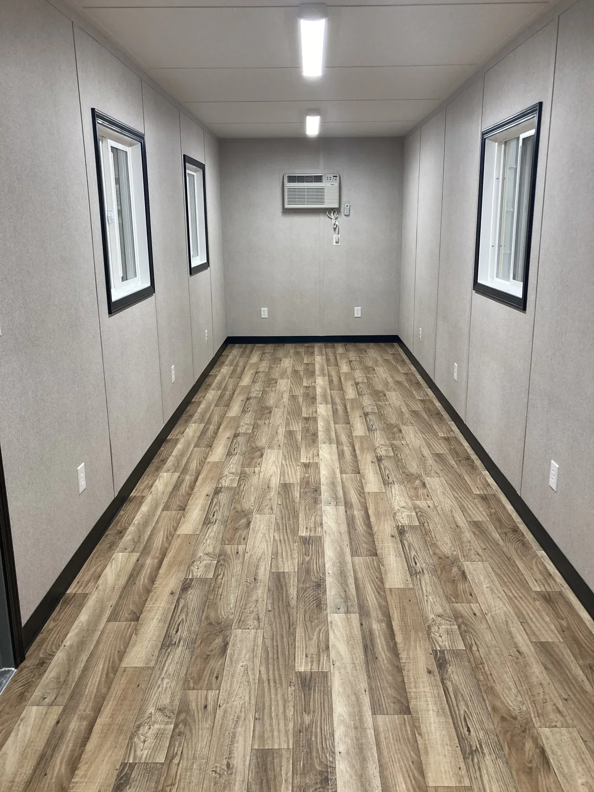 Finished office area inside a custom 8-by-40-foot unit
