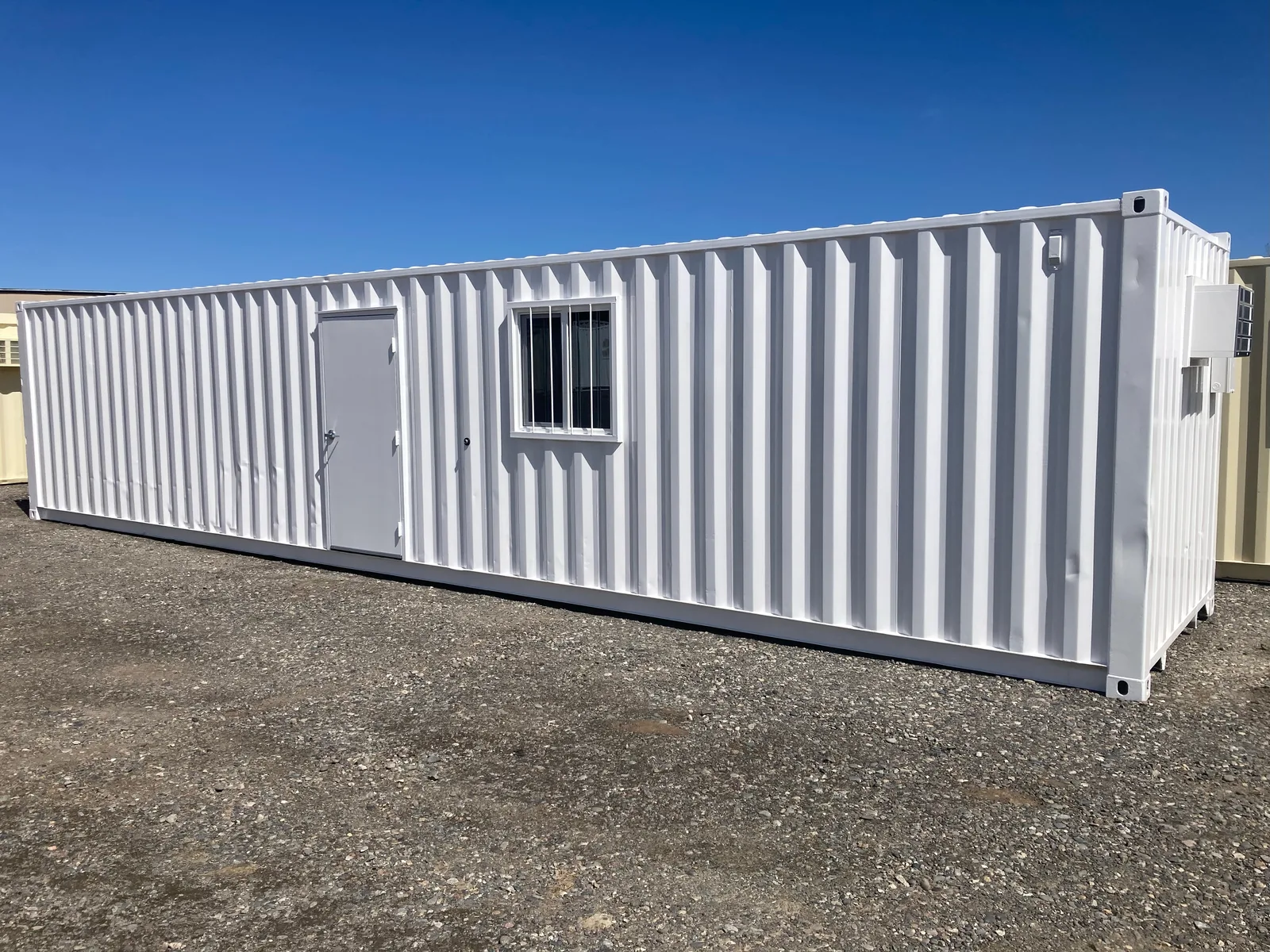 Exterior of a custom 8-by-40-foot unit with an OSB interior